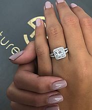 0.92 ct. t.w. I-SI2 Princess Cut Halo Solitaire Diamond Engagement Ring