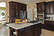 3 Ways Trending Kitchen Designs Are Using Cherry Cabinets and Other Dark Woods