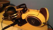 Sennheiser HD598 and Momentum over-ear with a Fiio E12 headphone amp