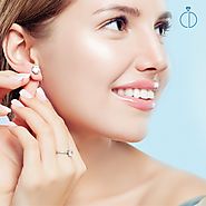 Website at https://centurydiamonds.com/diamond-stud-earrings/stud-earrings-collection/center-stone-shape/round.html
