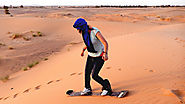 Merzouga Sandboarding - Erg Chebbi Sand board - Morocco Tours Agency
