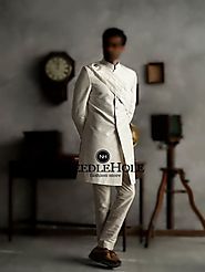 Off white raw silk groom sherwani design with white buttons
