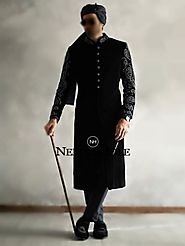 Black velvet groom sherwani design with embroidery on sleeves and collar