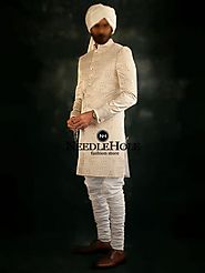 Breathtaking Pakistani designer groom wedding sherwani outfit in off white color