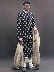 Make your entrance unforgettable moment with this stylish jamawar groom sherwani suit in black color