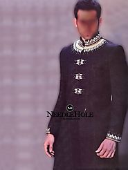 Give a modern look to your personality with this miraculous groom wedding sherwani attire in black jamawar