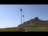 An Sgurr and wind turbines Isle of Eigg Scotland