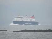 M.V. Finlaggan travelling at high speed past Ardrossan in strong wind