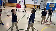 Dennis on Twitter"More volleying and striking in #PhysEd @sandhartford Students had to keep one foot in the hula hoop...