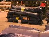 Aid being loaded onto a plane in Sydney heading for Samoa 2009 News